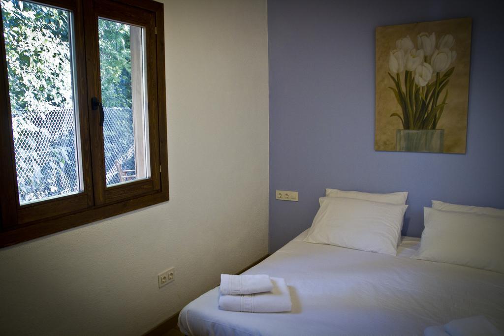 Apartamentos El Bosquet Сант-Кугат-дель-Вальес Номер фото